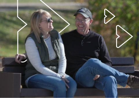 Karen, an Intracept patient, smiles outdoors.